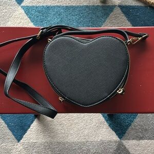 Small black heart-shaped crossbody handbag